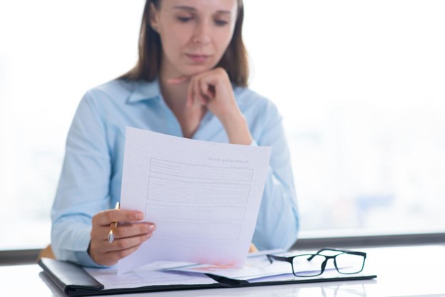 A legal assistant student reviewing a permanent residency application
