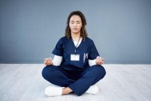 A health care aide taking a break and practicing mindfulness