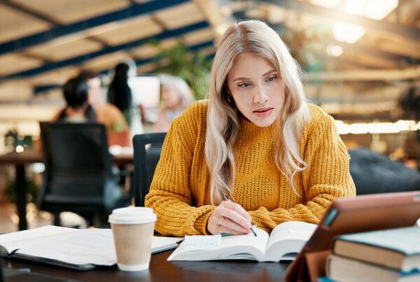 A student researching career college programs for fall enrollment