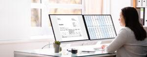  A payroll administration training using a modern payroll software interface on a desktop