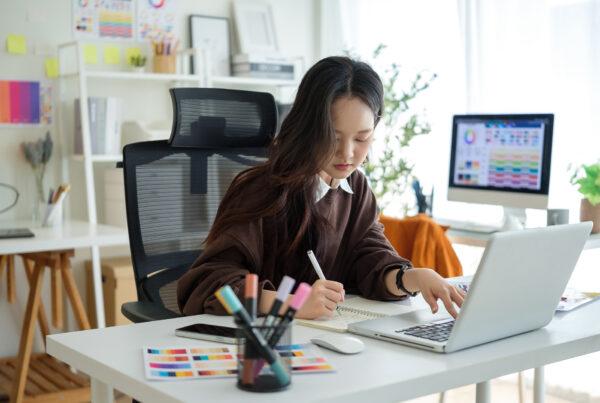 A web design student working on a digital portfolio
