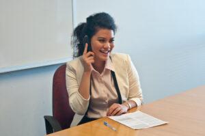 A student in an admin assistant course practicing communication skills