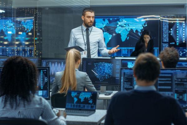 An instructor teaching virtualization and cloud management in a network administrator course