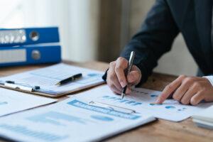 An accounting administrator reviewing financial documents