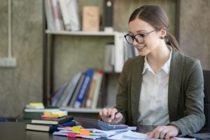 An accounting administration student practicing bookkeeping skills