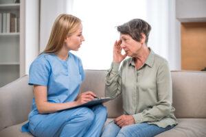  A health care aide training graduate listening compassionately to a concerned family member