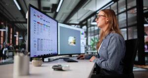 A business administration student collaborating in a professional setting