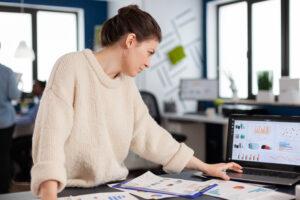 A marketing coordinator professional planning campaigns using analytics tools