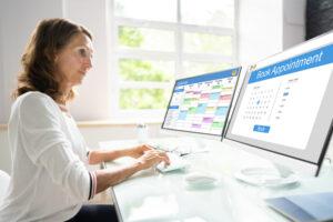 Clinic calendar management is being handled by a medical office assistant