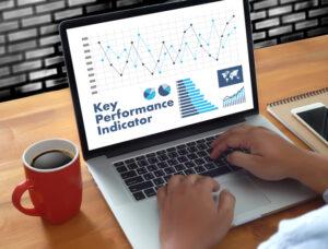 New manager reviewing KPI dashboard on a laptop, demonstrating data-driven decision making