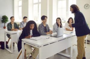 A career college classroom with students participating in an in-person lesson