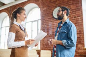 Employer speaking with practicum student about workplace responsibilities